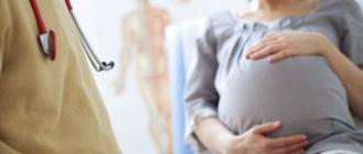 Судороги в животе при беременности: причины возникновения